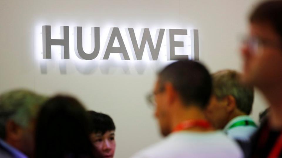 The Huawei logo is pictured at the IFA consumer tech fair in Berlin, Germany, September 6, 2019. REUTERS/Hannibal Hanschke/File Photo