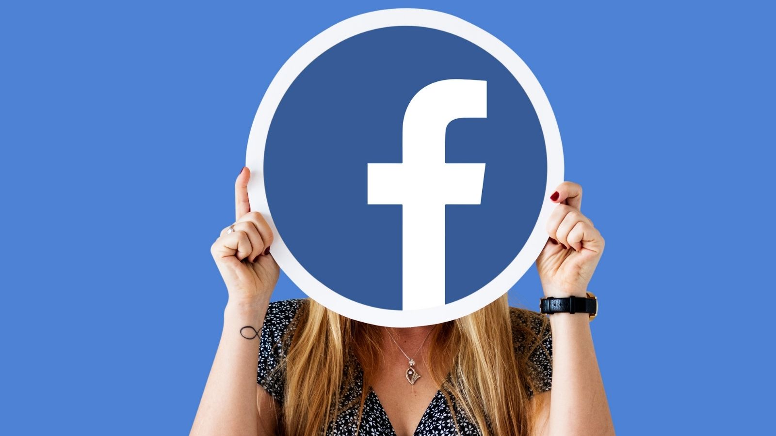 Woman Holding FB Icon