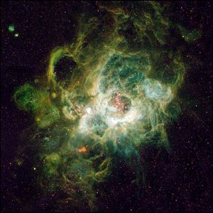 NGC 604, обширная туманность, расположенная в соседней спиральной галактике M33, в созвездии Треугольника