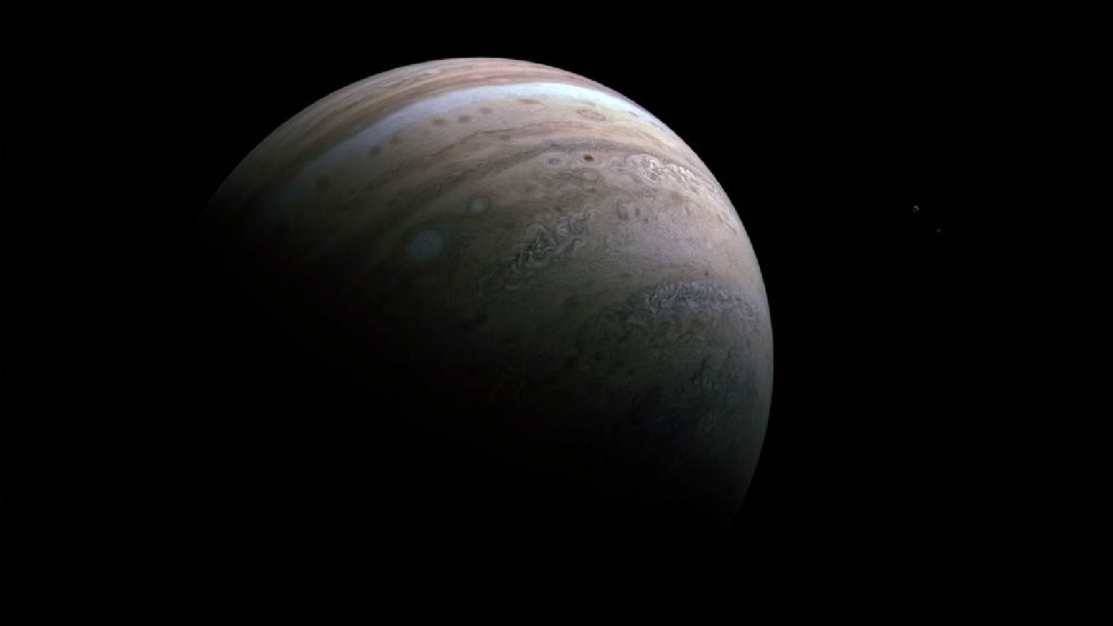 Космический корабль НАСА сделал снимки спутников Юпитера Ио и Европы